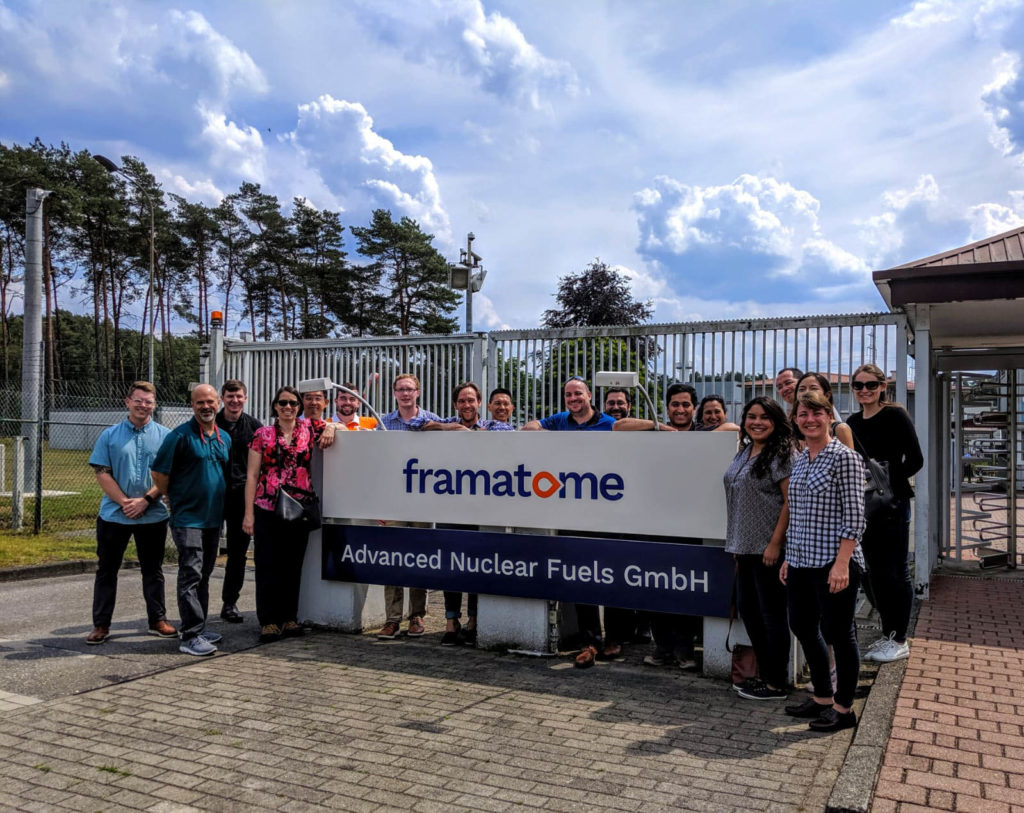 participants pose in front of the Framatome facility