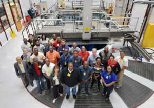 The group tours the TRIGA reactor at the Texas A&M Nuclear Engineering and Science Center.